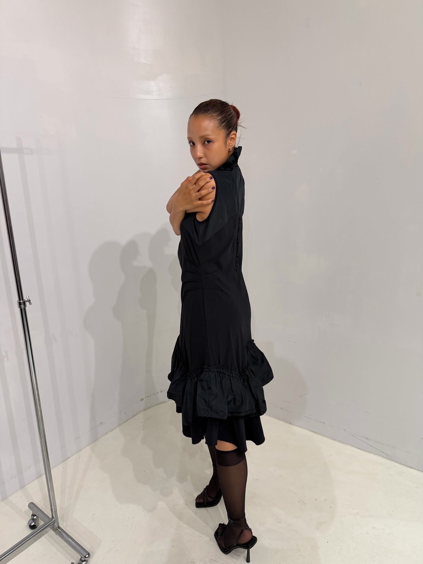 black frilled sleeveless log top