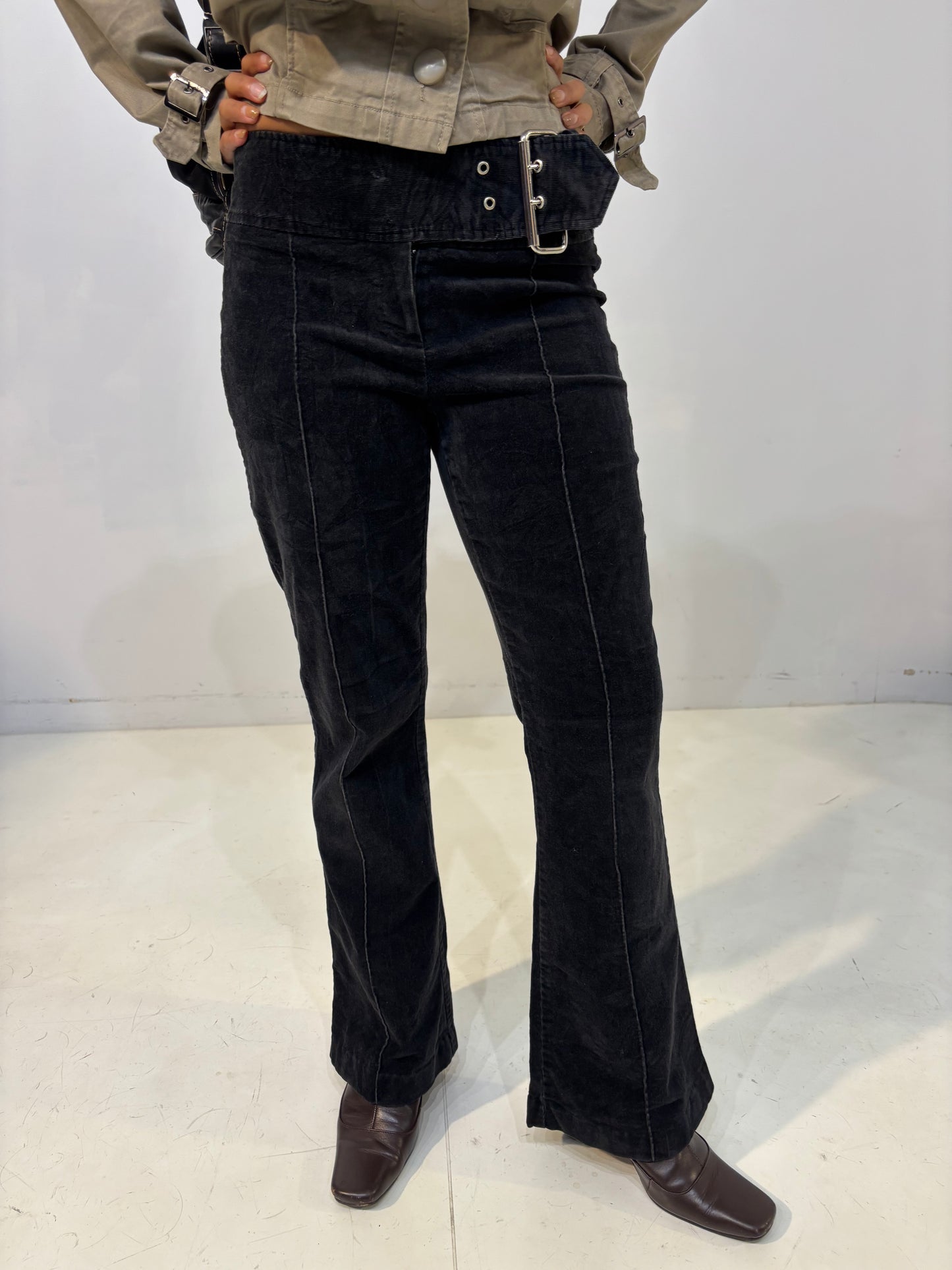 belted low-waisted flared black corduroy pants