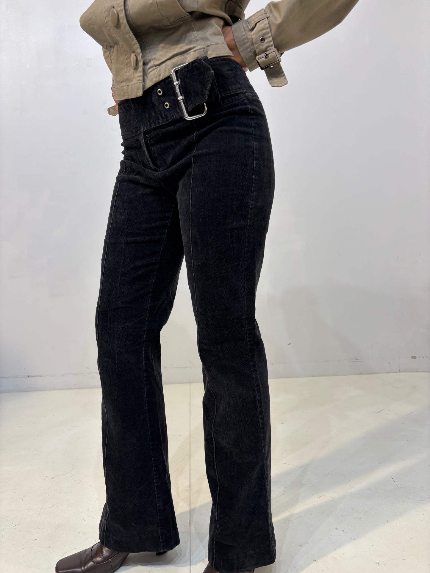 belted low-waisted flared black corduroy pants