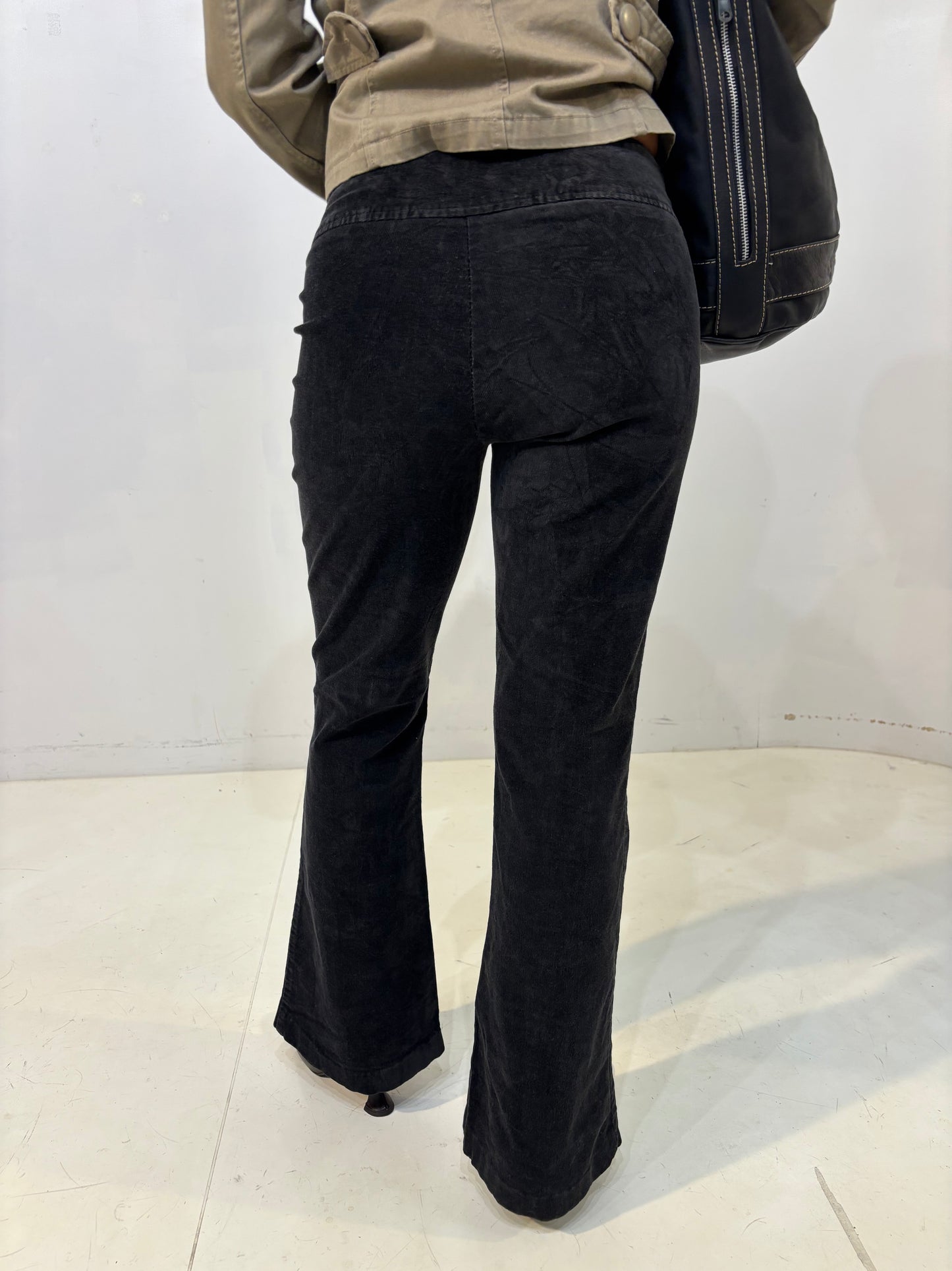 belted low-waisted flared black corduroy pants