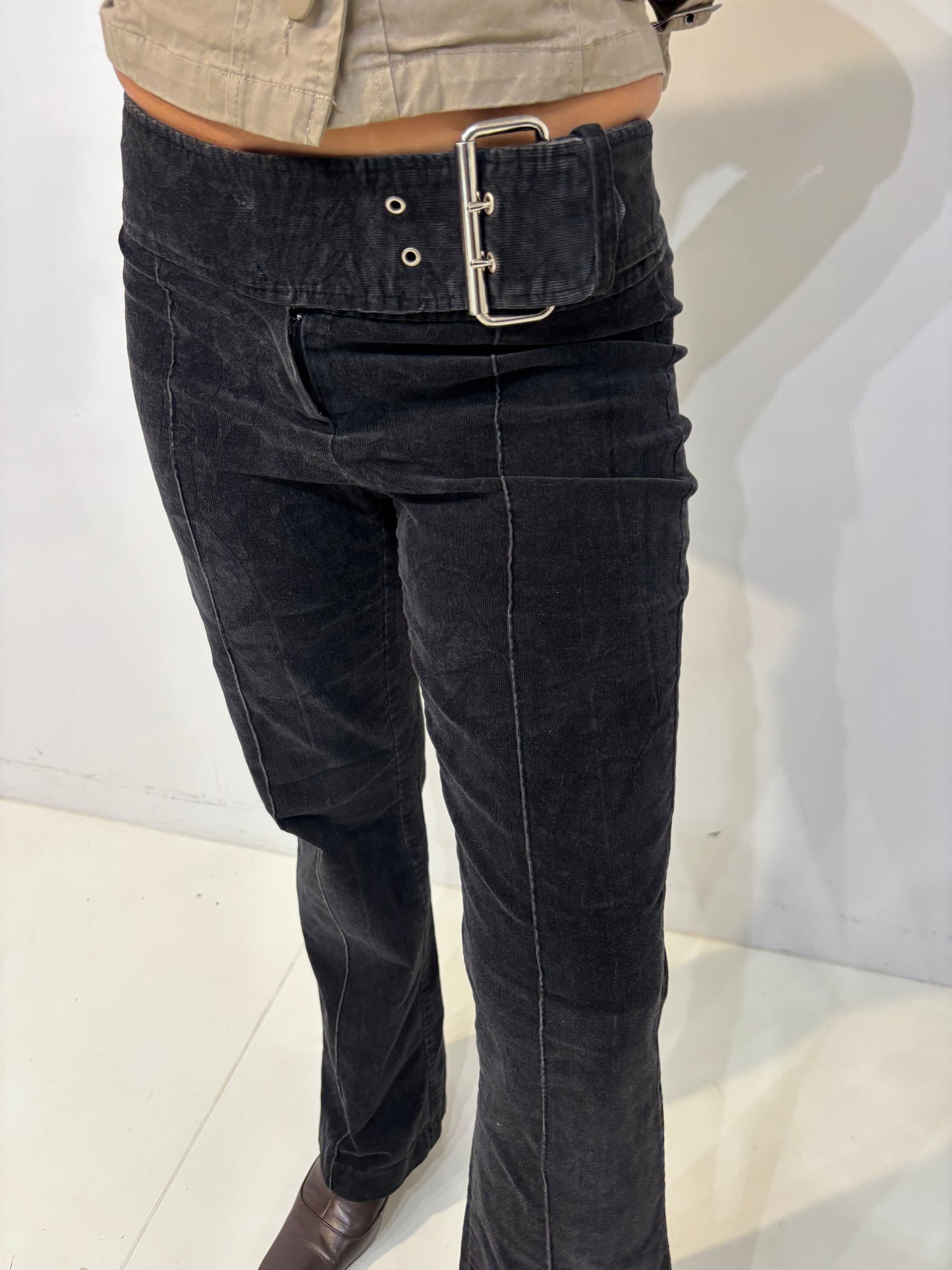 belted low-waisted flared black corduroy pants
