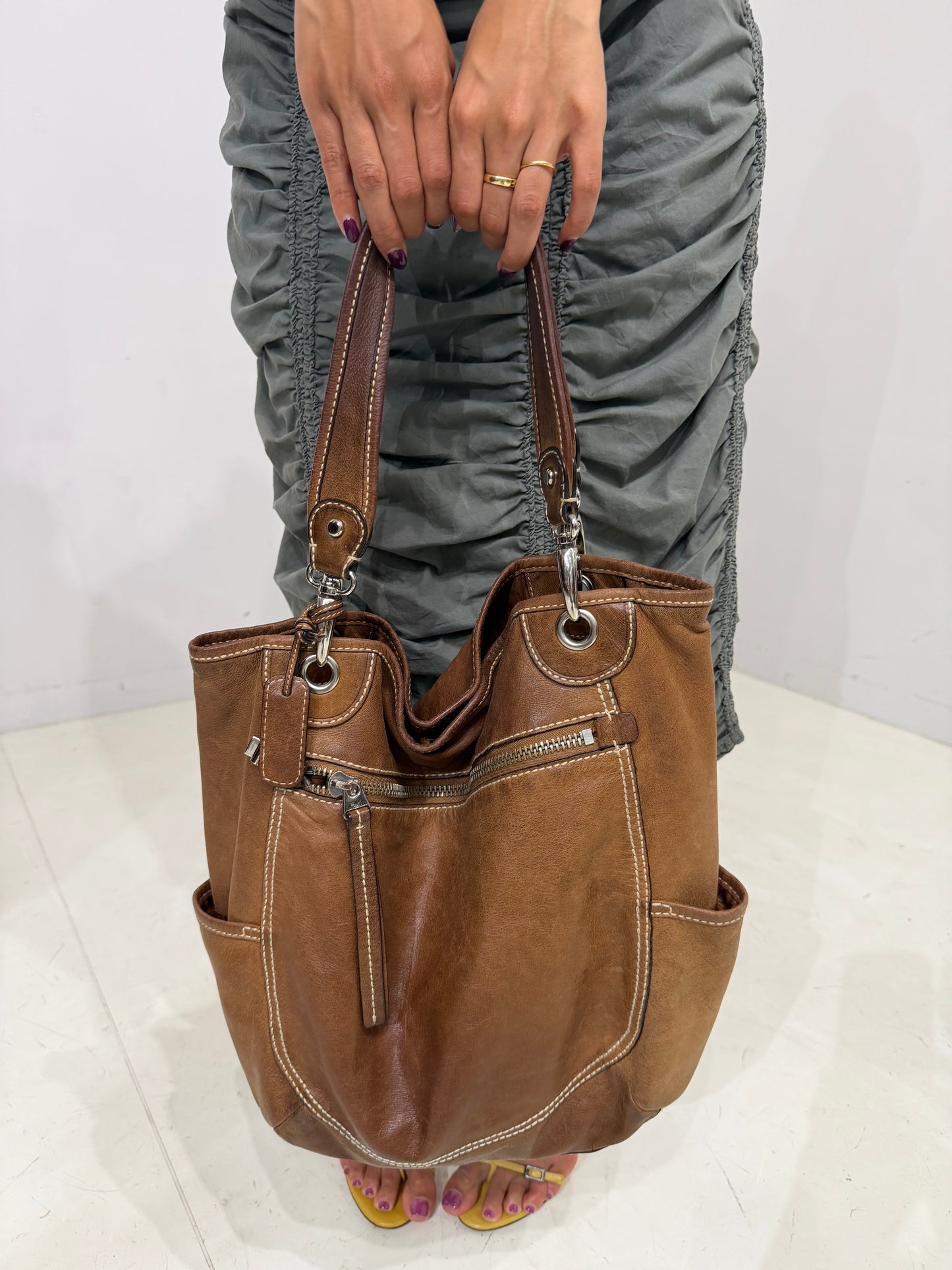 brownleather white stitched shoulder bag